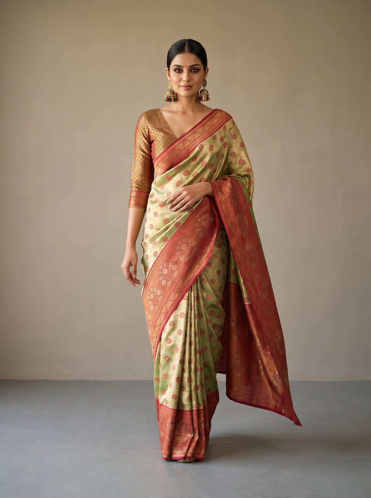 MIMOSA Olive Kanjivaram Art Silk Saree β close-up of pallu drape over arm