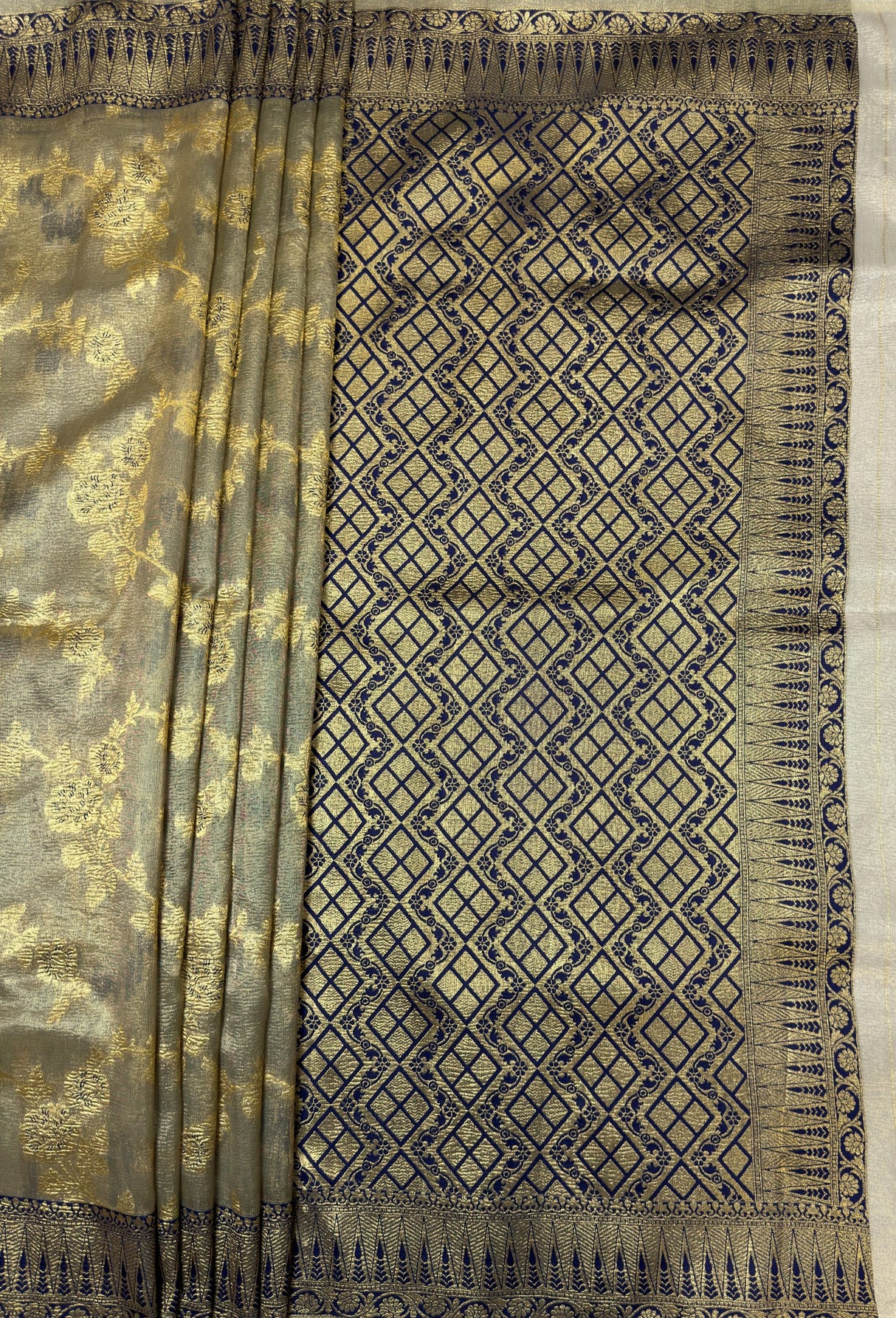 MIMOSA Navy Banarasi Art Silk Saree - close-up of hand and bangles near stairs