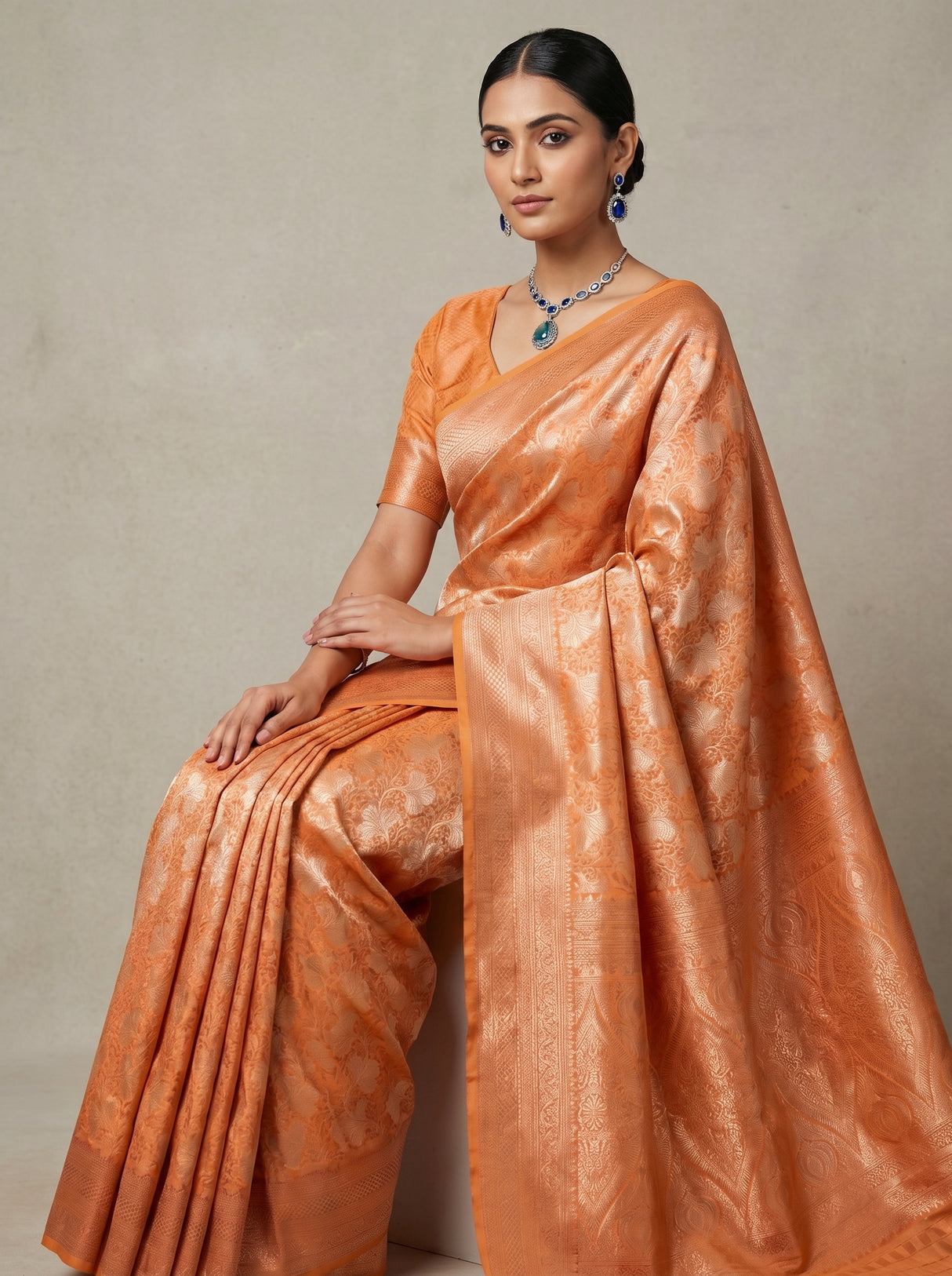MIMOSA Orange Kanjivaram Art Silk Saree β close-up of the pleats and border
