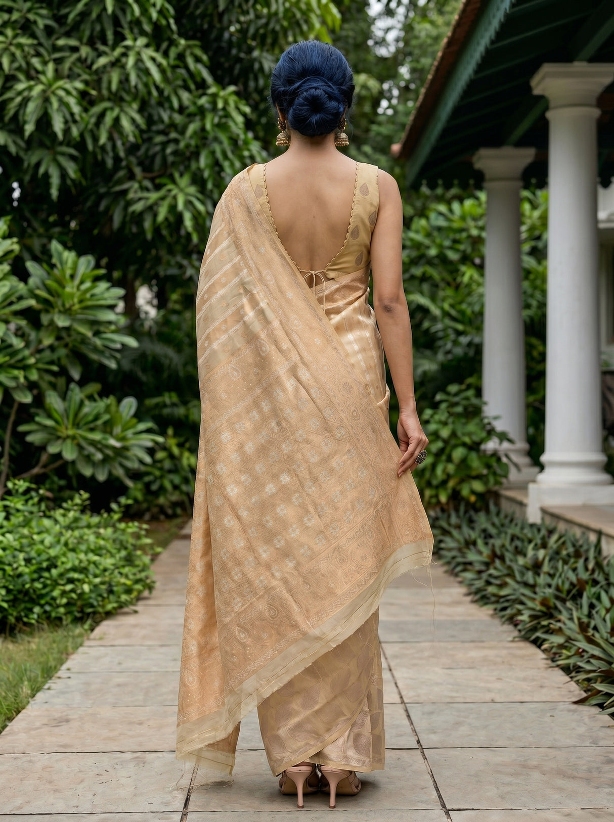 MIMOSA Tussar Banarasi Art Silk Saree — Close-up of model's face and earrings