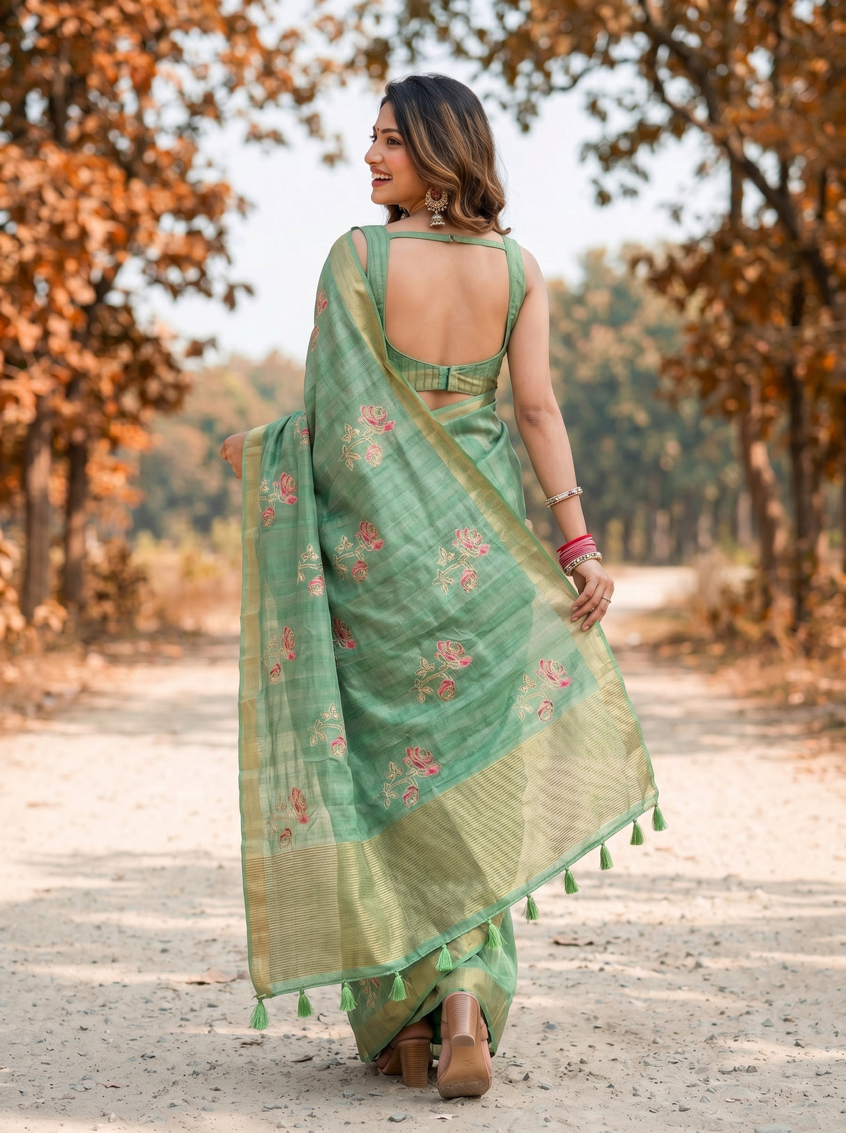 MIMOSA Pista Banarasi Art Silk Saree — Model smiling close-up