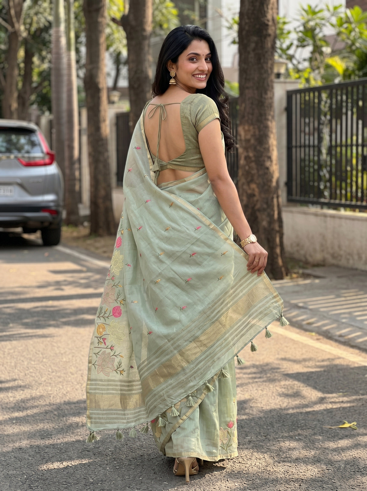MIMOSA Pista Banarasi Art Silk Saree — Close-up of model's face