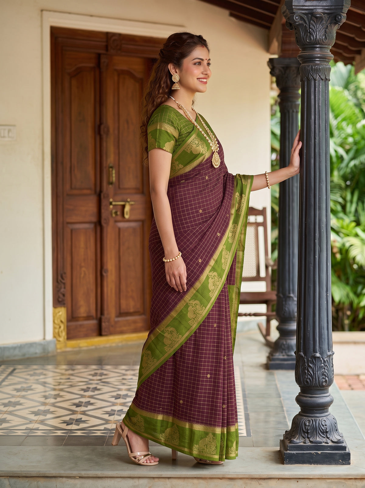 MIMOSA Chocolate Mysore Silk Crepe Saree — Model smiling showing jewellery
