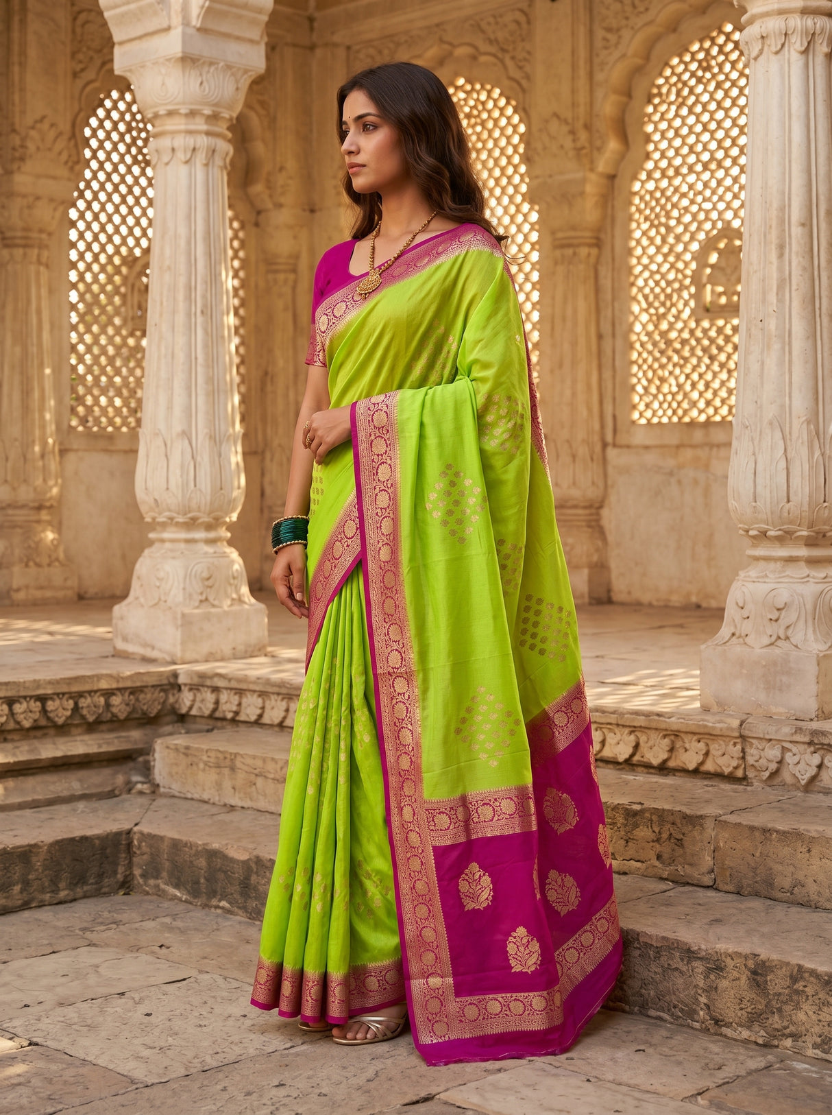 MIMOSA Parrot Green Mysore Silk crepe Saree — Model pose on stairs