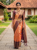 MIMOSA Orange Kanjivaram Art Silk Saree — model standing outdoors