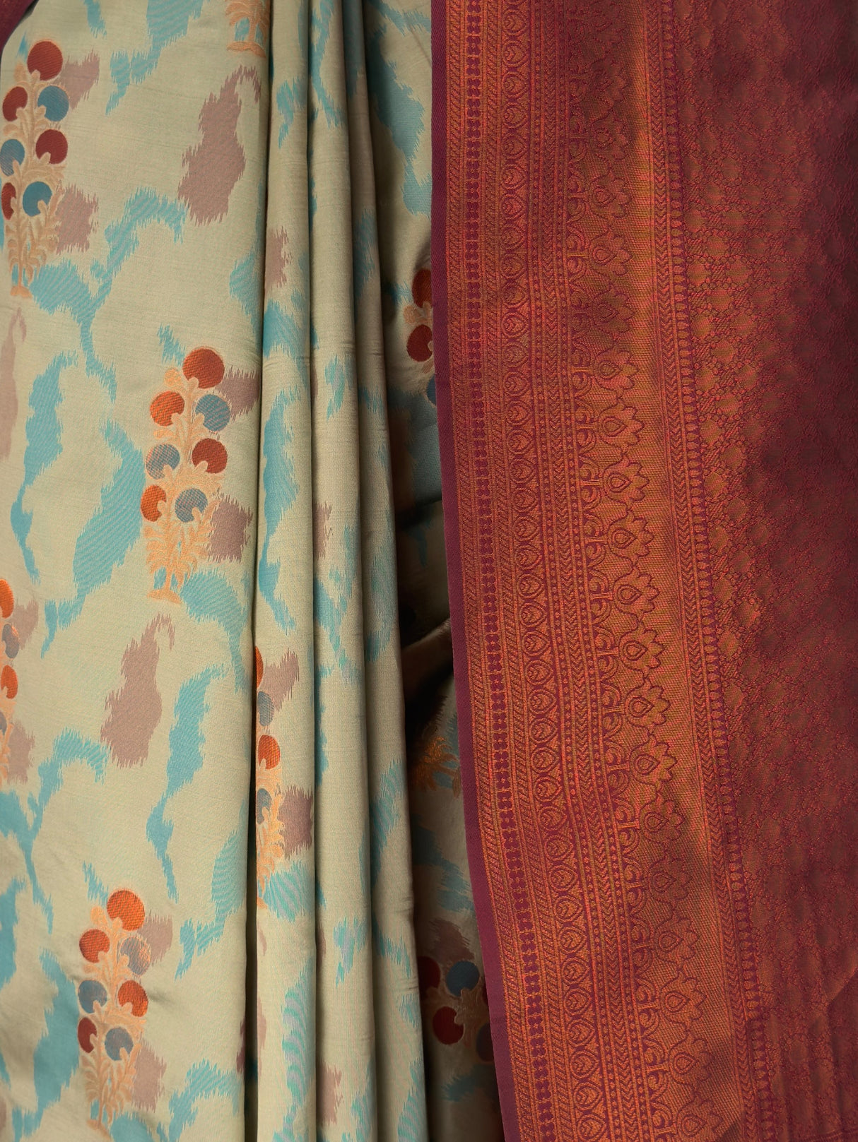 MIMOSA Chiku Pochampally Art Silk Saree — Saree hem and white heels