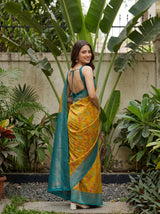 MIMOSA Olive Pochampally Art Silk Saree — Model arm and plant detail
