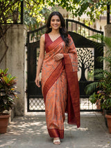MIMOSA Peach Pochampally Art Silk Saree — Model arm and plant detail