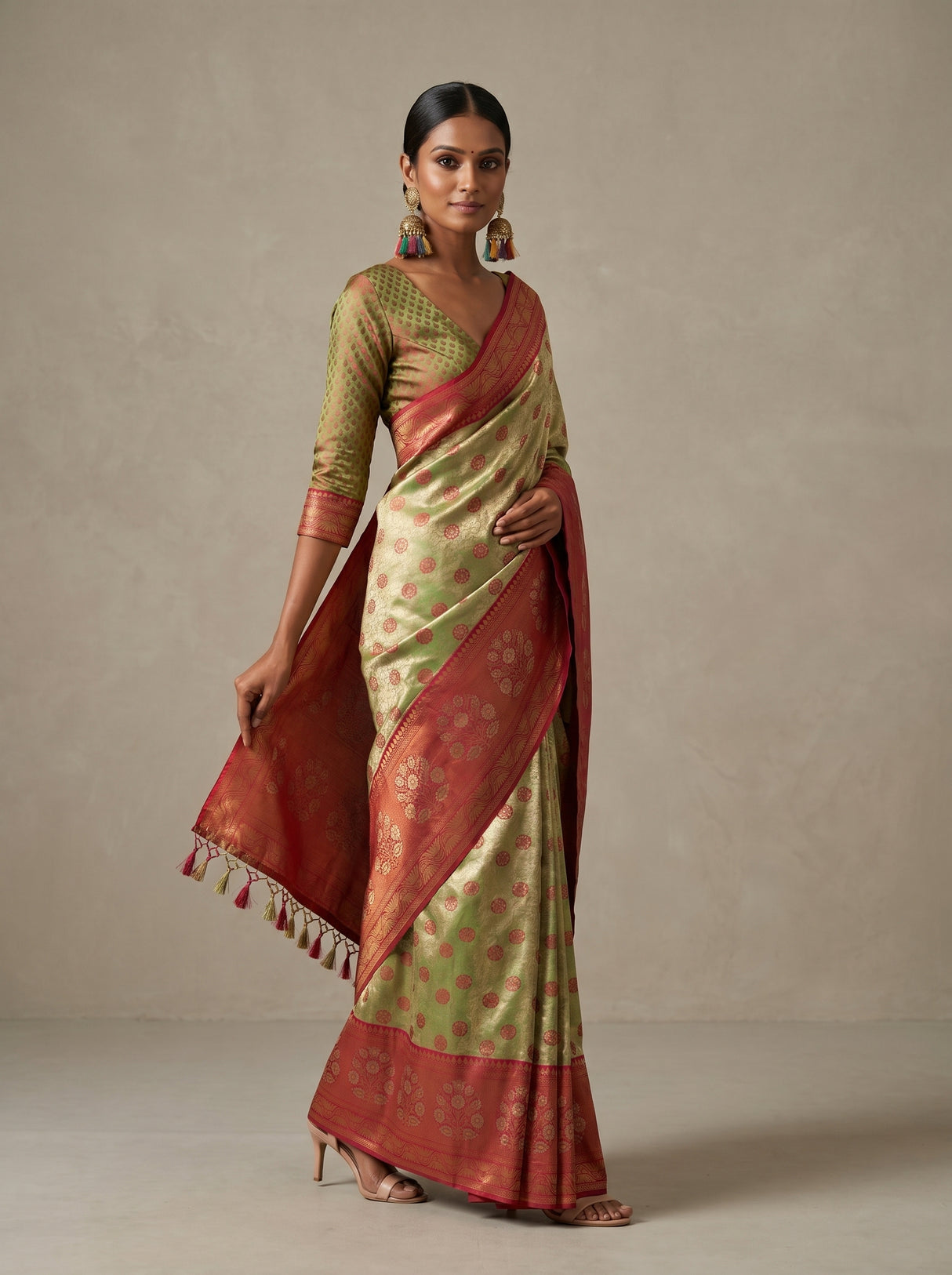 MIMOSA Olive Kanjivaram Art Silk Saree — mid-section showing border and hand