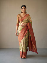 MIMOSA Olive Kanjivaram Art Silk Saree — close-up of pallu drape over arm
