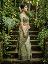 MIMOSA Green Banarasi Art Silk Saree - close-up of model's face and jewelry
