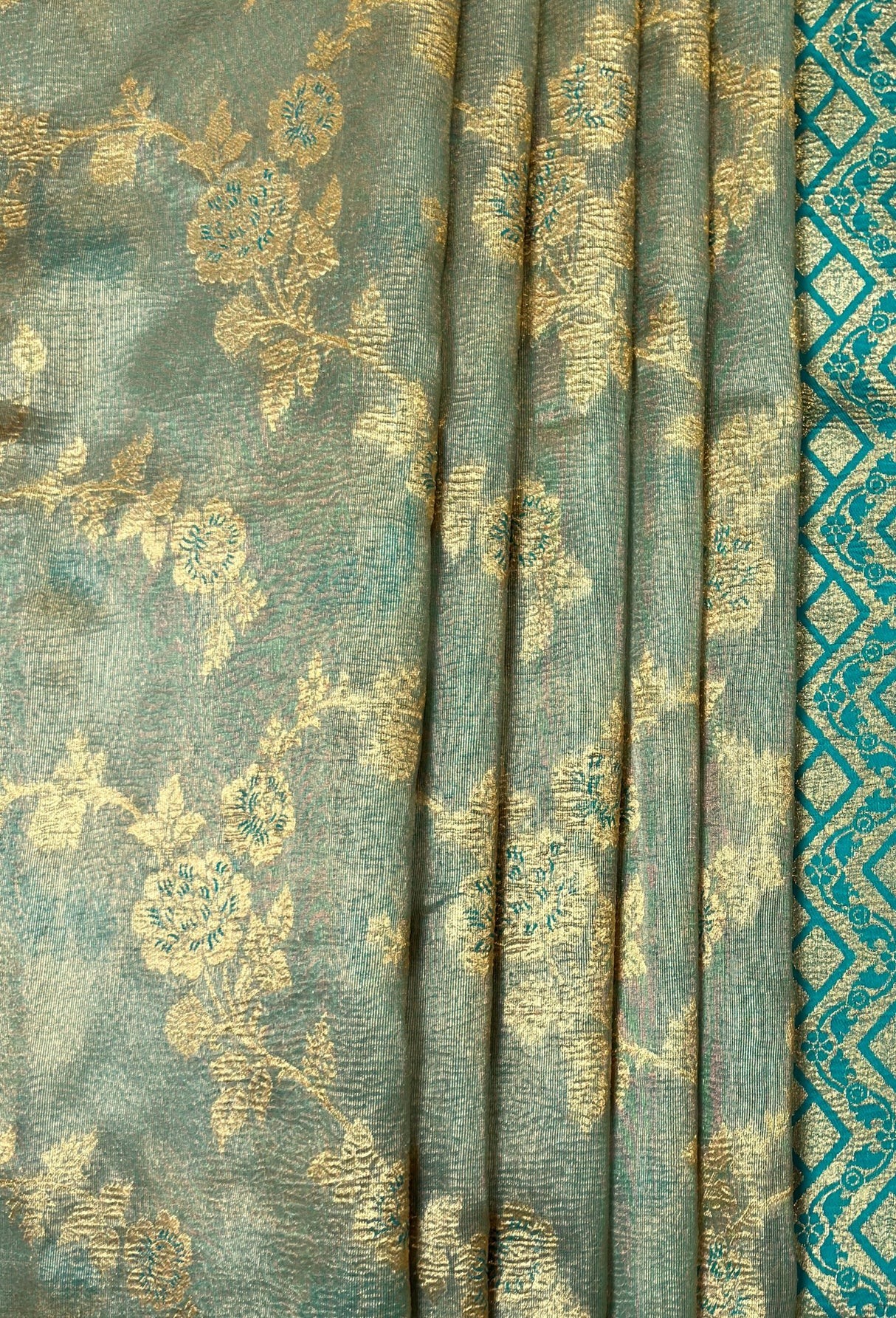 MIMOSA Saffire Banarasi Art Silk Saree - close-up of pallu detail near foliage