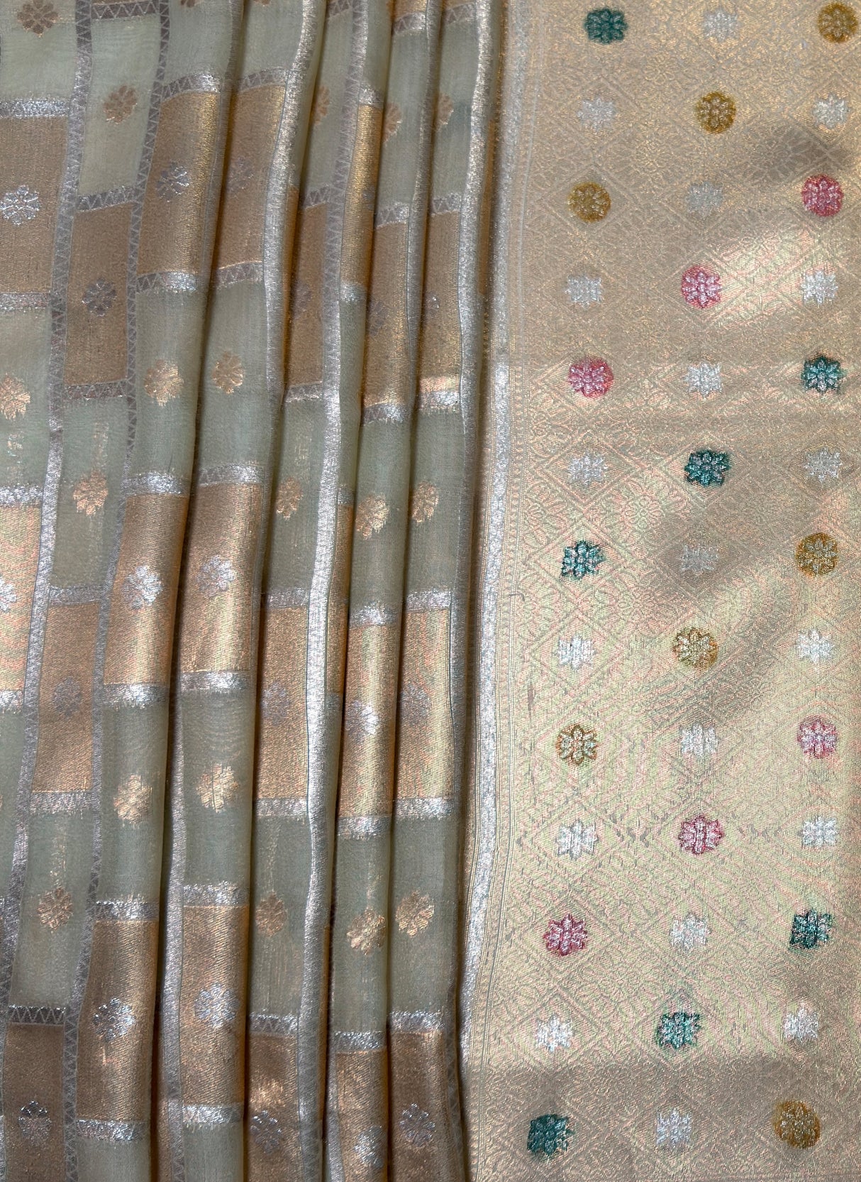 MIMOSA Half White Banarasi Art Silk Saree — Close-up of the lower drape and pleats