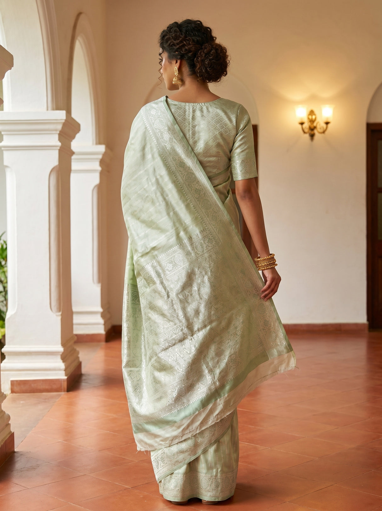 MIMOSA Pista Kanjivaram Art Silk Saree — close-up of face and shoulder