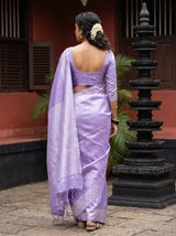 MIMOSA Violet Kanjivaram Art Silk Saree — close-up of face and earrings