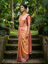 MIMOSA Peach Kanjivaram Art Silk Saree — Close-up of Face and Jewelry