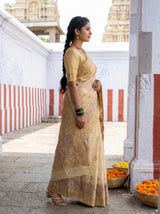 MIMOSA Mustard Banarasi Linen Saree — Styled on model in a traditional setting