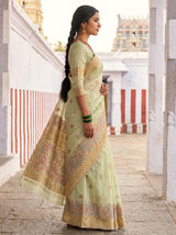 MIMOSA Pista Banarasi Linen Saree — Styled on model in a traditional setting