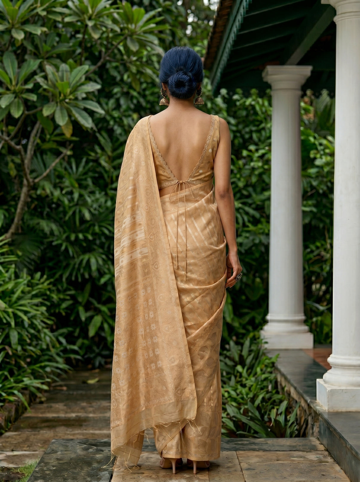 MIMOSA Chiku Banarasi Art Silk Saree — Close-up of model's face and earrings