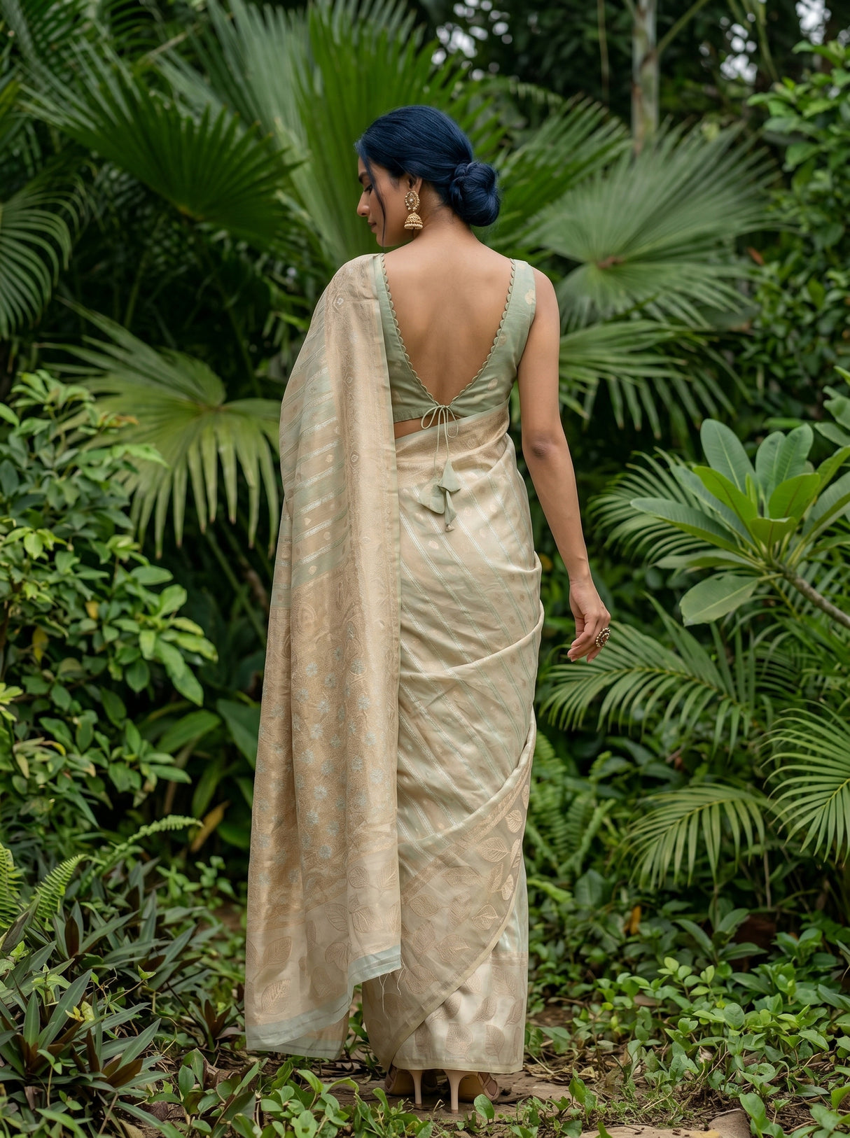 MIMOSA Rama Banarasi Art Silk Saree — Close-up of model's face and earrings