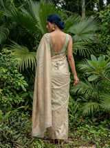 MIMOSA Rama Banarasi Art Silk Saree — Close-up of model's face and earrings