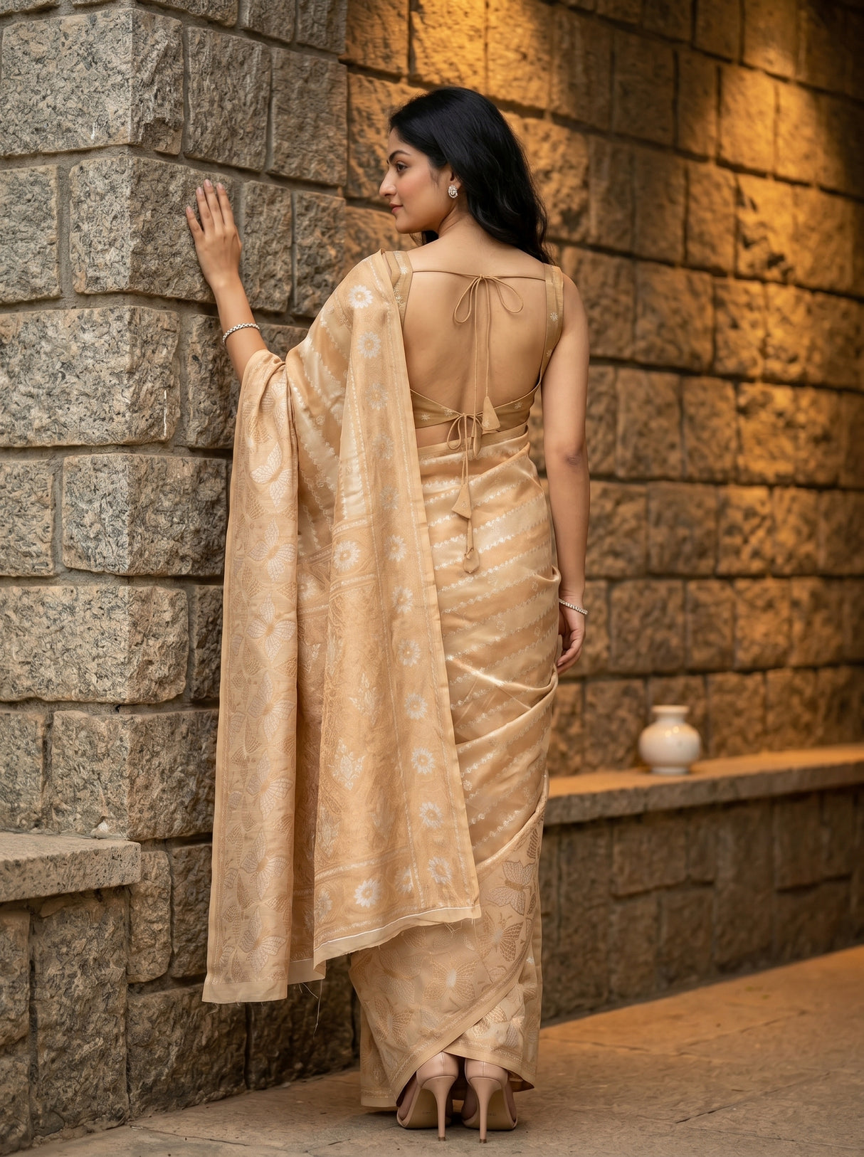 MIMOSA Chiku Banarasi Art Silk Saree — close-up of model's face and arm