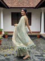 MIMOSA Pista Banarasi Art Silk Saree — Saree pallu and mirror reflection