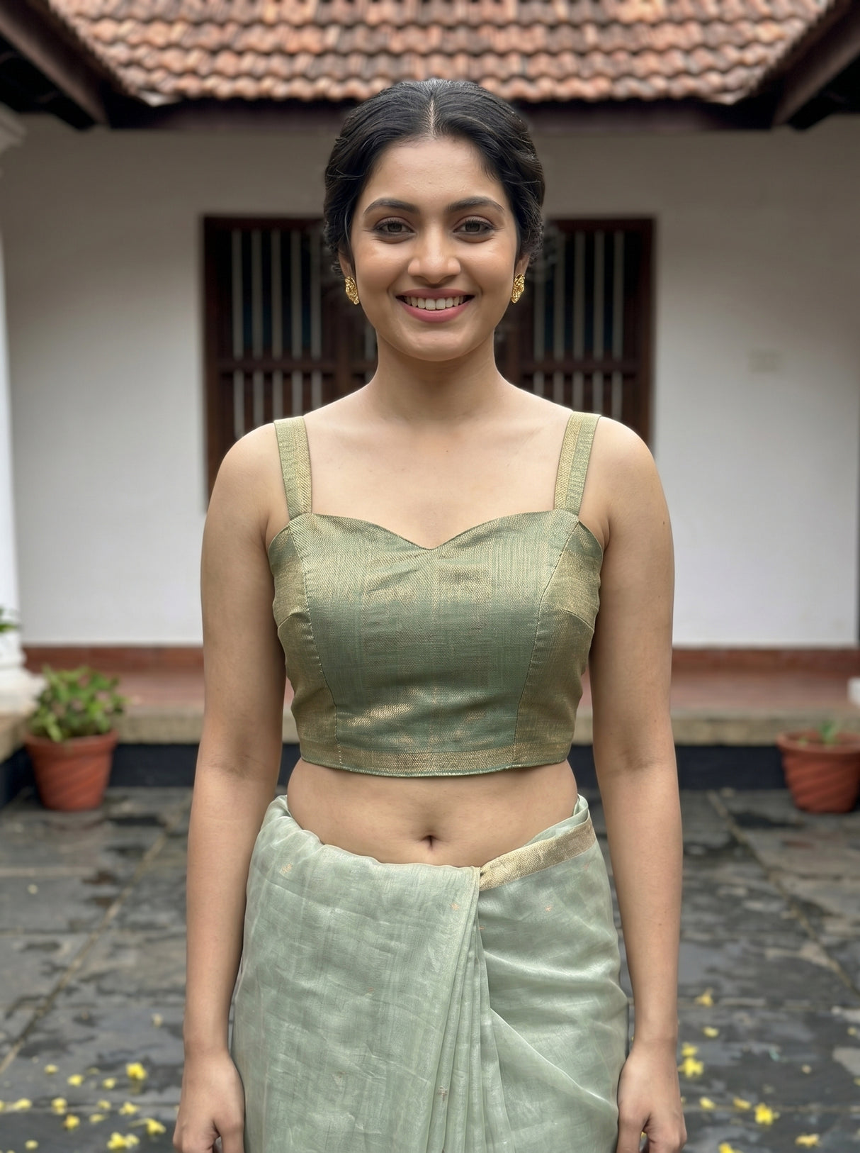 MIMOSA Pista Banarasi Art Silk Saree — Saree pallu, tassels, and feet