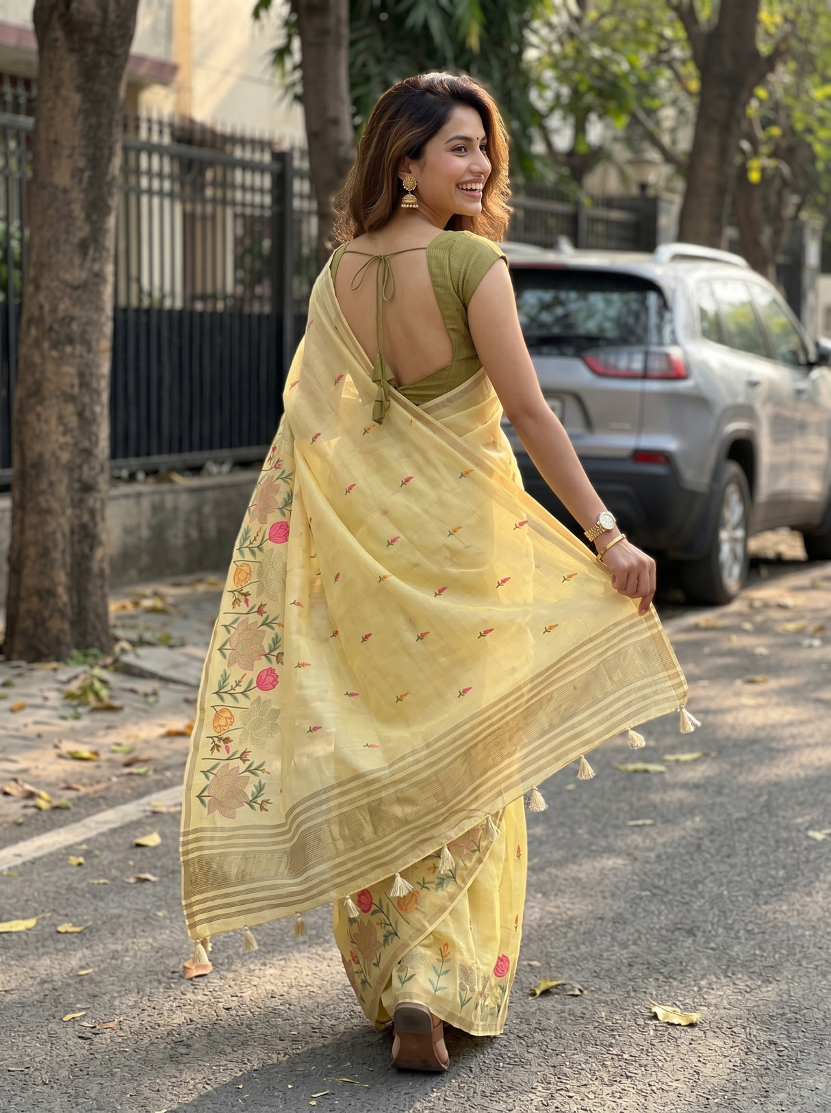 MIMOSA Yellow Banarasi Art Silk Saree — Close-up of model's face