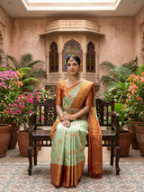 MIMOSA Pista Kanjivaram Art Silk Saree — hands and drape close-up