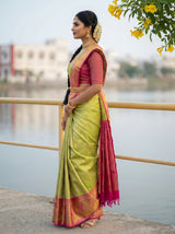 MIMOSA Parrot Green Kanjivaram Art Silk Saree — close-up of model's shoulder and hair