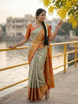MIMOSA Pista Kanjivaram Art Silk Saree — close-up of model's hands and waist belt