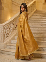 MIMOSA Mustard Kanjivaram Art Silk Saree — model's feet and saree hem