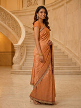 MIMOSA Orange Kanjivaram Art Silk Saree — side view on stairs