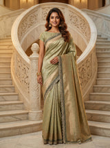 MIMOSA Pista Kanjivaram Art Silk Saree — model smiling on stairs