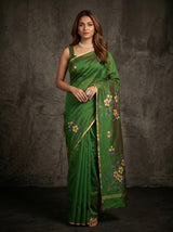 MIMOSA Green Banarasi Art Silk Saree — Model posing with blue jeep