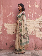 MIMOSA Bottle Green Banarasi Linen Saree — close-up of model's arm