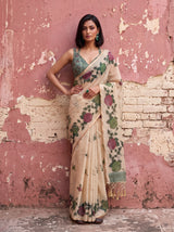 MIMOSA Bottle Green Banarasi Linen Saree — close-up of model's torso and hand with ring